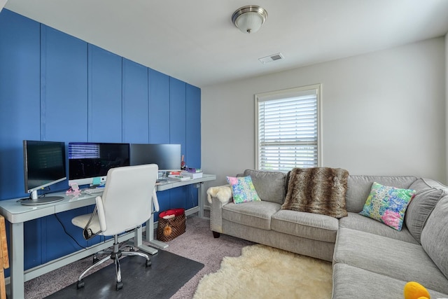 carpeted home office featuring visible vents