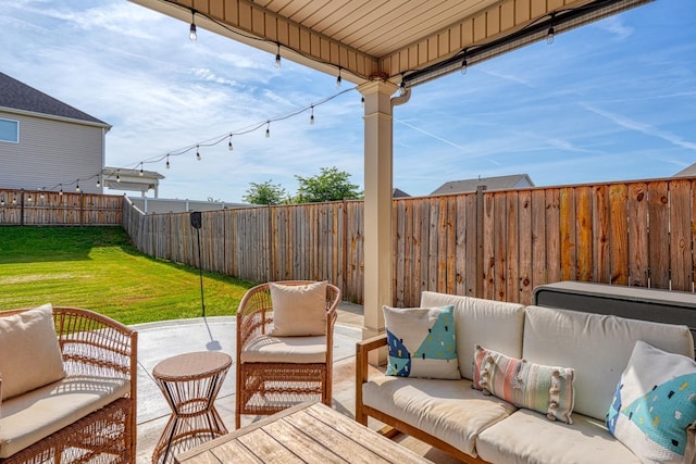 view of patio featuring an outdoor hangout area and a fenced backyard