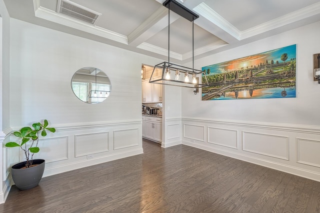 unfurnished dining area with dark wood finished floors, beamed ceiling, visible vents, ornamental molding, and coffered ceiling