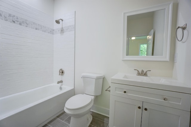 bathroom with tile patterned flooring, shower / tub combination, vanity, baseboards, and toilet