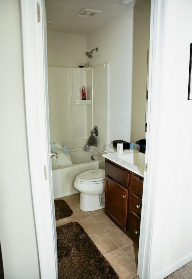 bathroom featuring toilet, visible vents, shower / washtub combination, and vanity
