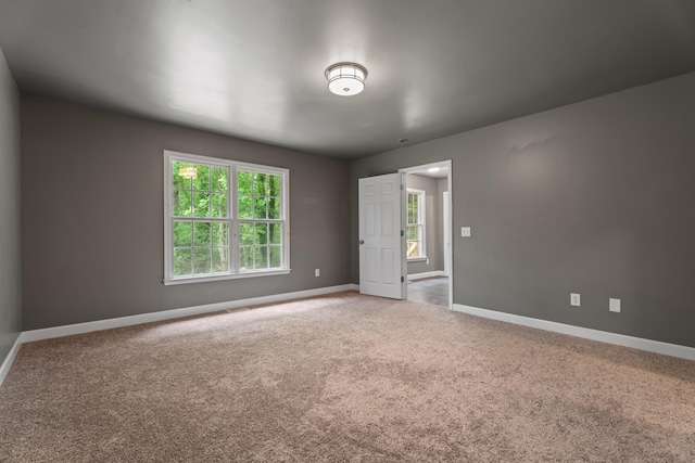 912 Still Spg, Inman, SC 29349 - spare room featuring baseboards and light colored carpet