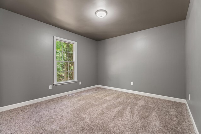 912 Still Spg, Inman, SC 29349 - spare room with carpet floors, baseboards, and visible vents