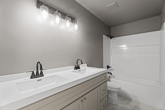 912 Still Spg, Inman, SC 29349 - bathroom with double vanity, a sink, marble finish floor, and toilet