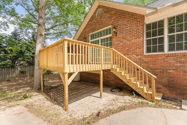 912 Still Spg, Inman, SC 29349 - exterior space featuring fence, brick siding, stairway, a deck, and a patio area