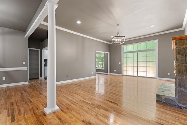 912 Still Spg, Inman, SC 29349 - unfurnished living room with recessed lighting, decorative columns, wood finished floors, and a chandelier