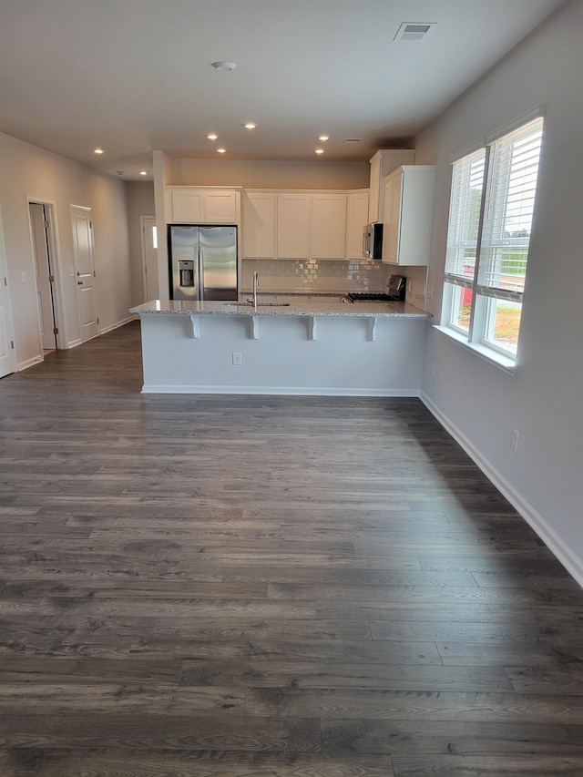 2050 Zanes Crk, Inman, SC 29349 - kitchen featuring recessed lighting, stainless steel appliances, a peninsula, and white cabinetry
