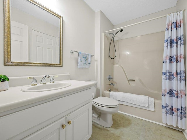 bathroom with vanity, toilet, and shower / bath combo