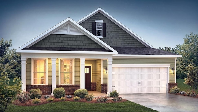 craftsman-style house featuring concrete driveway and a garage