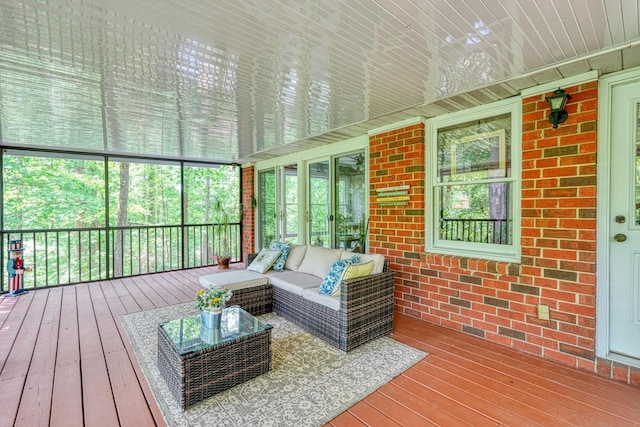 sunroom / solarium with an outdoor hangout area