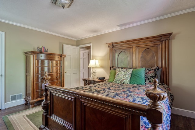 bedroom with ornamental molding, baseboards, dark wood-style floors, and visible vents