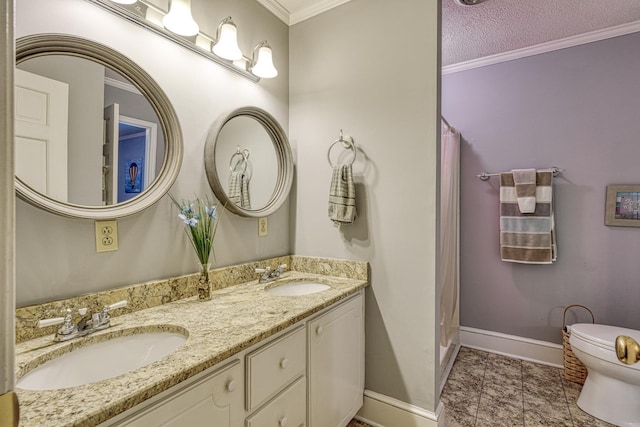 full bath featuring toilet, ornamental molding, and a sink