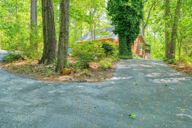 view of side of property with driveway