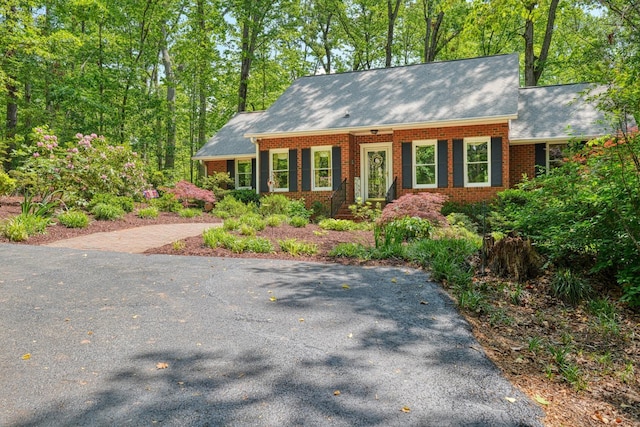 view of front of home featuring brick siding