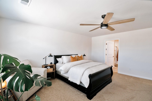 bedroom featuring ceiling fan, light carpet, baseboards, and visible vents