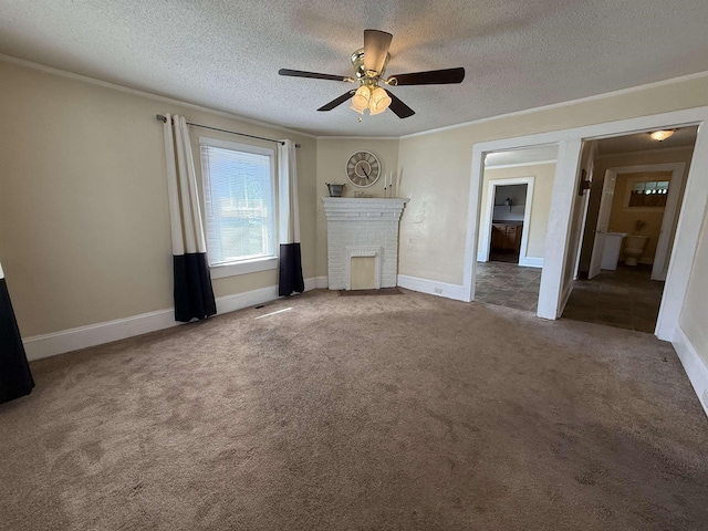 unfurnished living room featuring a fireplace, carpet floors, a textured ceiling, baseboards, and ceiling fan