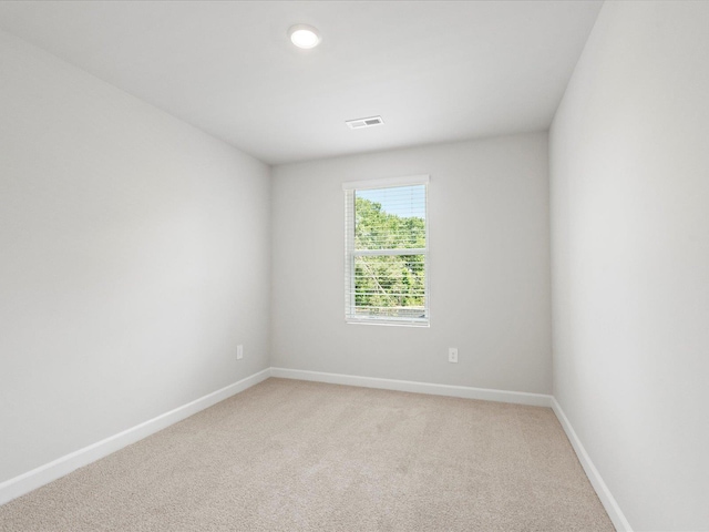 114 Arrow, Greer, SC 29651 - unfurnished room with light carpet, baseboards, and recessed lighting