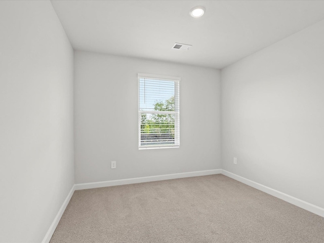 114 Arrow, Greer, SC 29651 - carpeted spare room featuring baseboards and recessed lighting