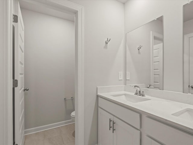 124 Arrow, Greer, SC 29651 - bathroom featuring double vanity and toilet