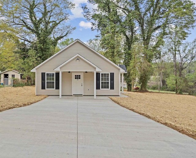 bungalow-style house featuring driveway
