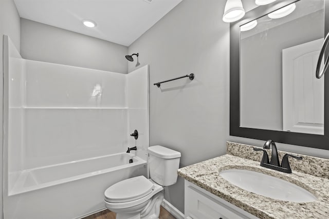 full bathroom featuring toilet, vanity, shower / bathing tub combination, and wood finished floors