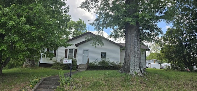 view of home's exterior featuring a yard
