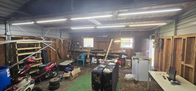 garage with a workshop area
