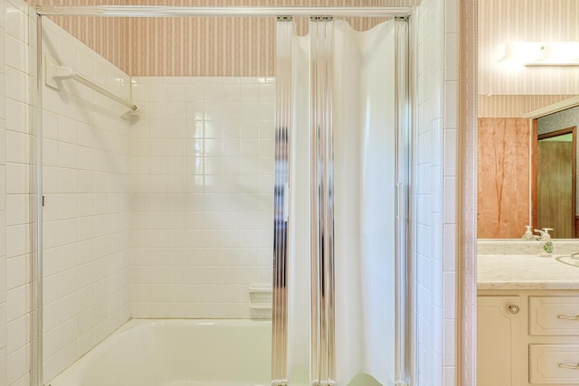 full bathroom with vanity and enclosed tub / shower combo