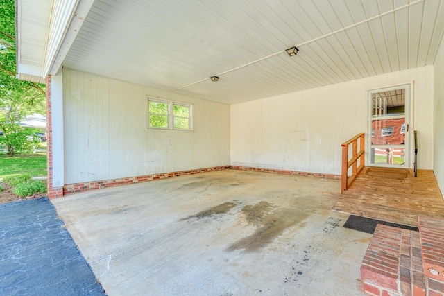 exterior space with a carport