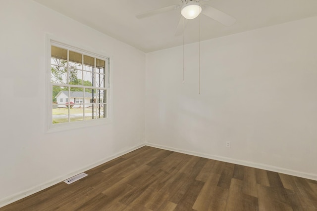 111 Linville, Moore, SC 29369 - unfurnished room with dark wood finished floors, a ceiling fan, and baseboards