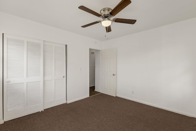 111 Linville, Moore, SC 29369 - unfurnished bedroom featuring dark carpet, a closet, baseboards, and ceiling fan