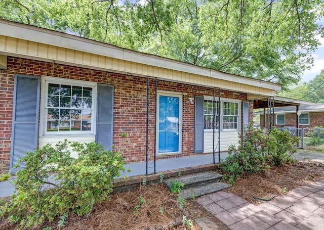 111 Linville, Moore, SC 29369 - view of front of house with a porch, brick siding, and fence