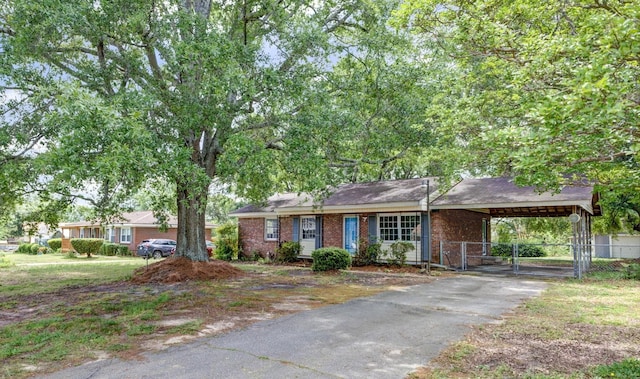 111 Linville, Moore, SC 29369 - ranch-style home featuring fence, a gate, brick siding, driveway, and a carport