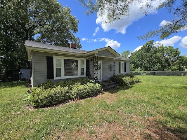bungalow featuring a chimney