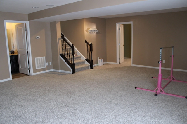 playroom featuring carpet and baseboards