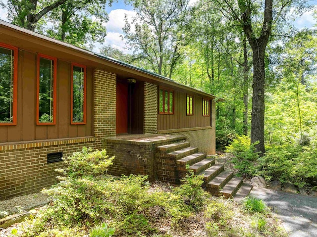 132 Rosecrest, Spartanburg, SC 29303 - view of front of property featuring brick siding and board and batten siding