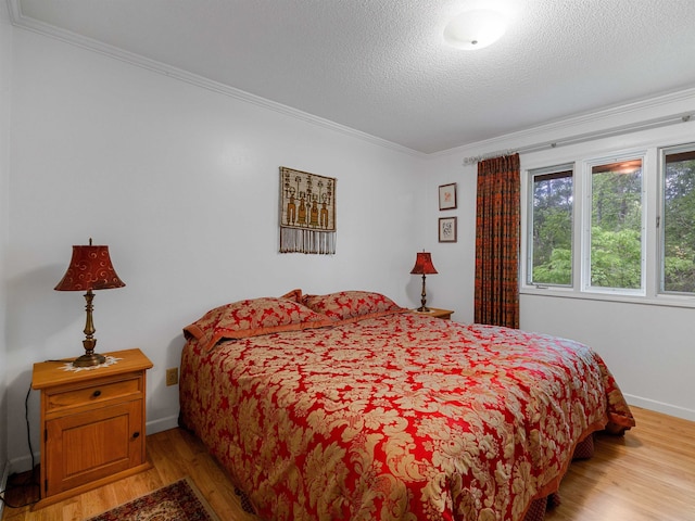 132 Rosecrest, Spartanburg, SC 29303 - bedroom featuring crown molding, wood finished floors, and baseboards