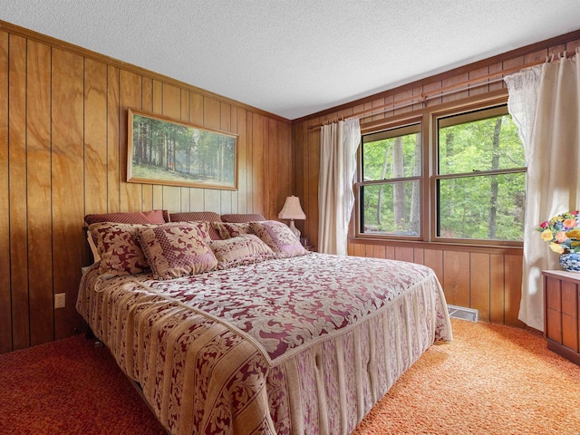 132 Rosecrest, Spartanburg, SC 29303 - bedroom featuring carpet, wood walls, and a textured ceiling