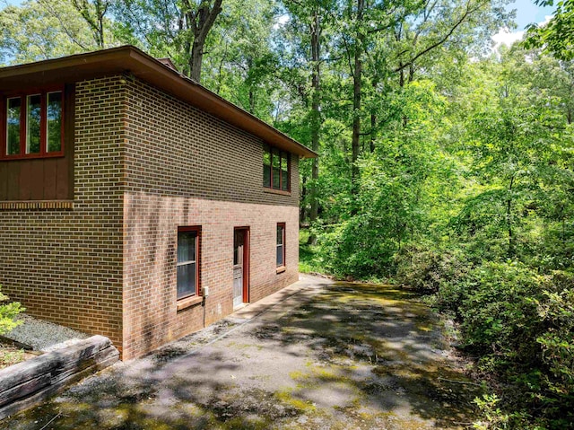 132 Rosecrest, Spartanburg, SC 29303 - view of property exterior featuring brick siding and a patio area