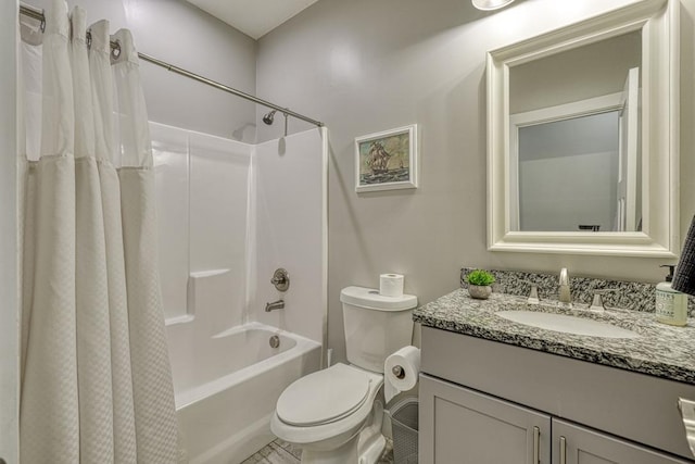 full bath featuring vanity, shower / bath combo, and toilet