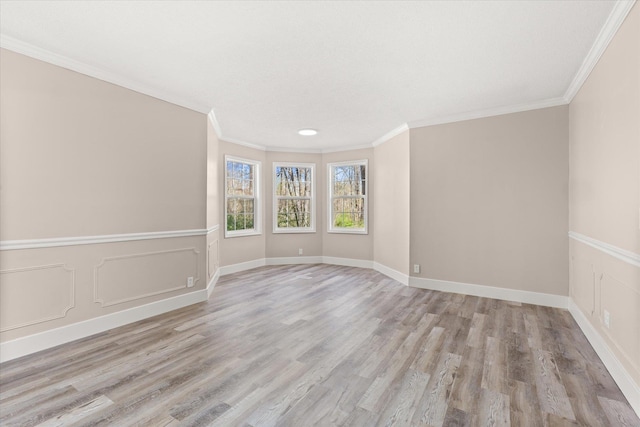 216 Ashmore, Greer, SC 29650 - spare room featuring wood finished floors, ornamental molding, and baseboards