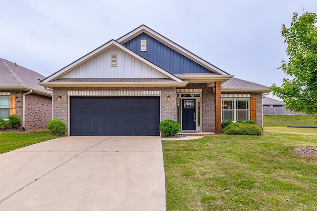 view of front of home with a front yard, a garage, concrete driveway, and brick siding