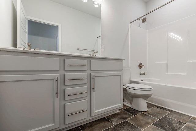 bathroom featuring toilet, double vanity, and  shower combination