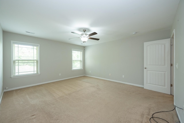 173 Tiara Rdg, Duncan, SC 29334 - unfurnished room with a ceiling fan, light carpet, and baseboards