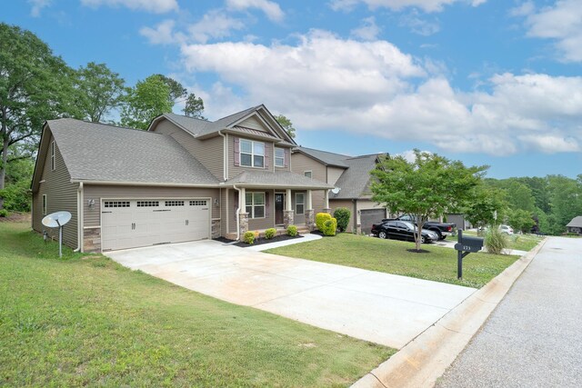 173 Tiara Rdg, Duncan, SC 29334 - craftsman house with driveway, an attached garage, a front yard, covered porch, and roof with shingles