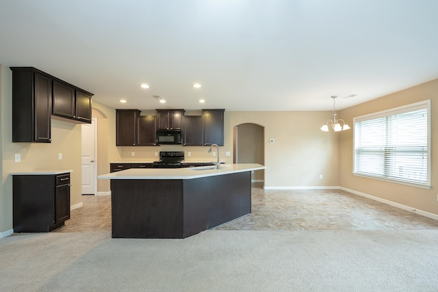 173 Tiara Rdg, Duncan, SC 29334 - kitchen with black appliances, arched walkways, a chandelier, light carpet, and dark brown cabinets