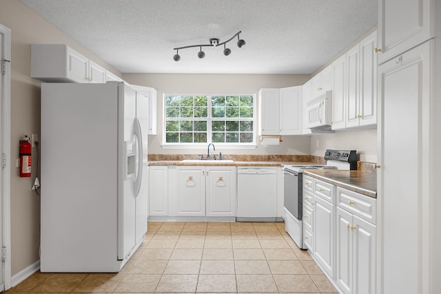 2 Birch Tree, Greer, SC 29651 - kitchen featuring white appliances, a sink, white cabinetry, a textured ceiling, and light tile patterned flooring