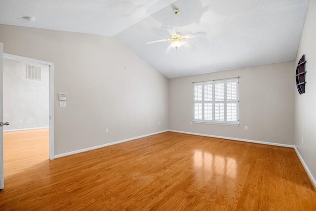 2 Birch Tree, Greer, SC 29651 - empty room with lofted ceiling, a ceiling fan, light wood-style flooring, baseboards, and a smoke detector