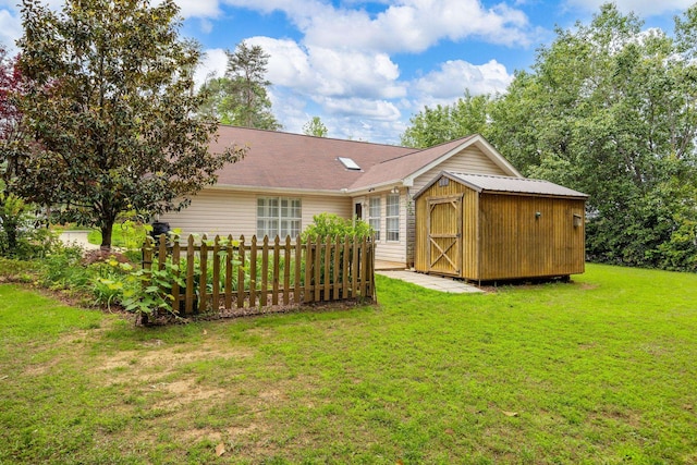 2 Birch Tree, Greer, SC 29651 - back of house featuring a storage unit, a yard, and an outbuilding