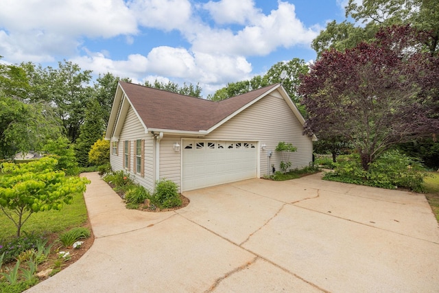 2 Birch Tree, Greer, SC 29651 - view of side of property with a garage and a shingled roof